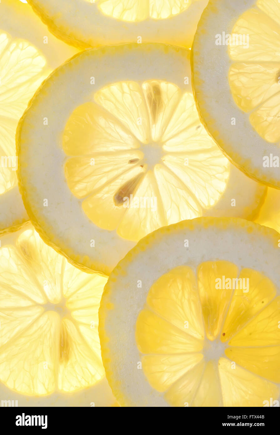 Macro freschi fette di limone sfondo Foto Stock