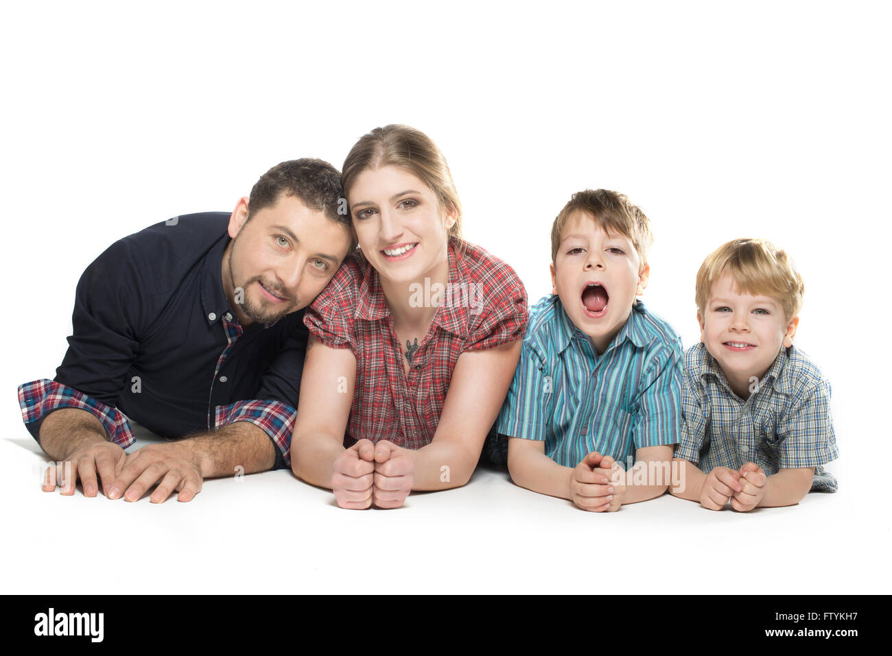 Felice famiglia sana sorridente godendo un momento Foto Stock