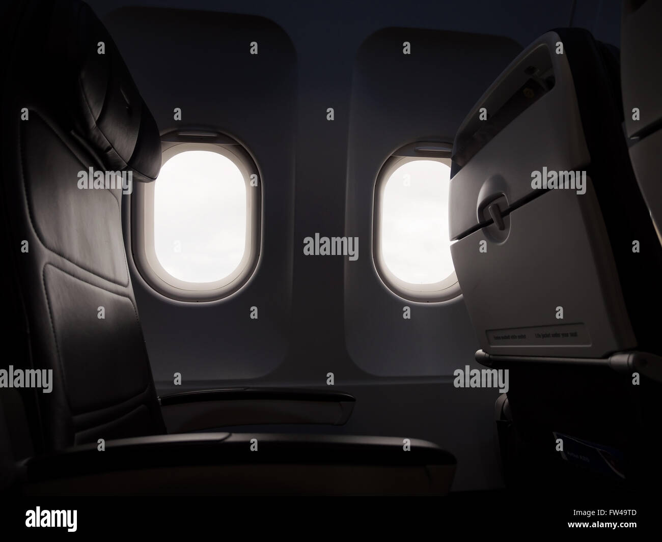 Windows e economia vuoti posti su un aereo. Foto Stock