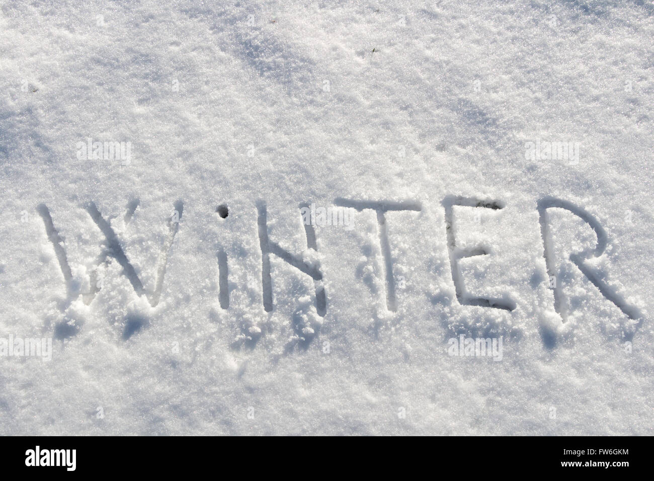 Parole scritte, inverno su un campo di neve Foto Stock