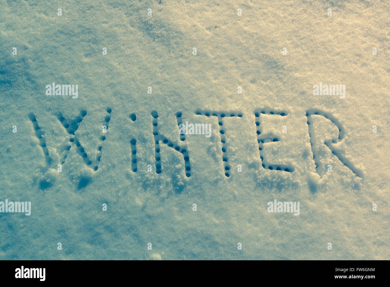 Parole scritte, inverno su un campo di neve Foto Stock