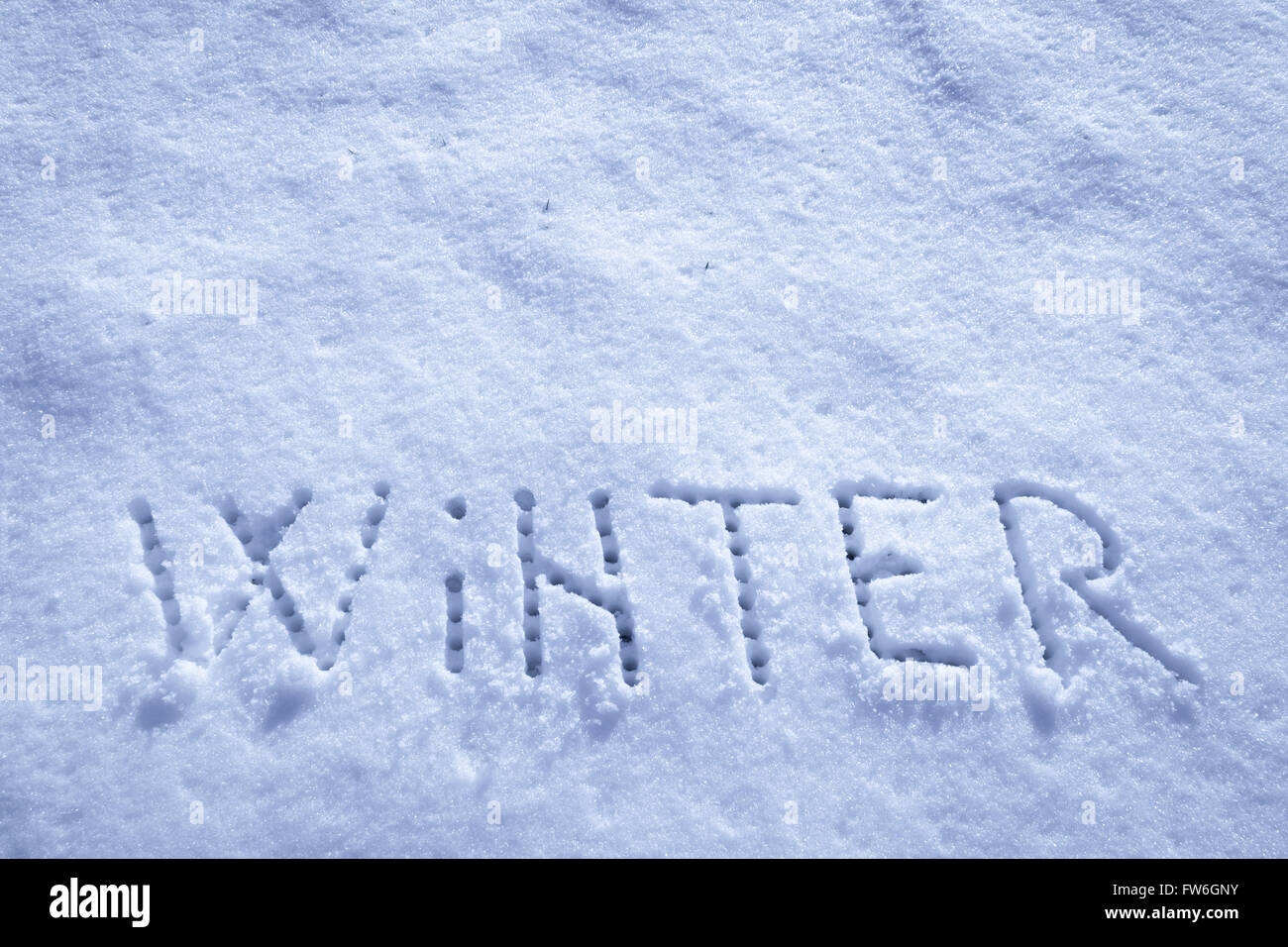 Parole scritte, inverno su un campo di neve Foto Stock