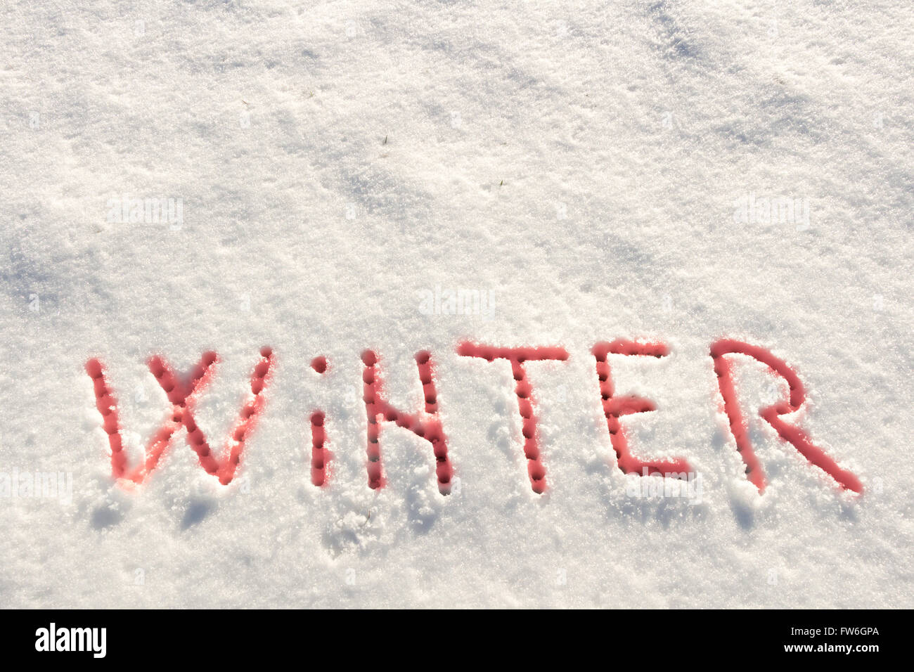 Parole scritte, inverno su un campo di neve Foto Stock