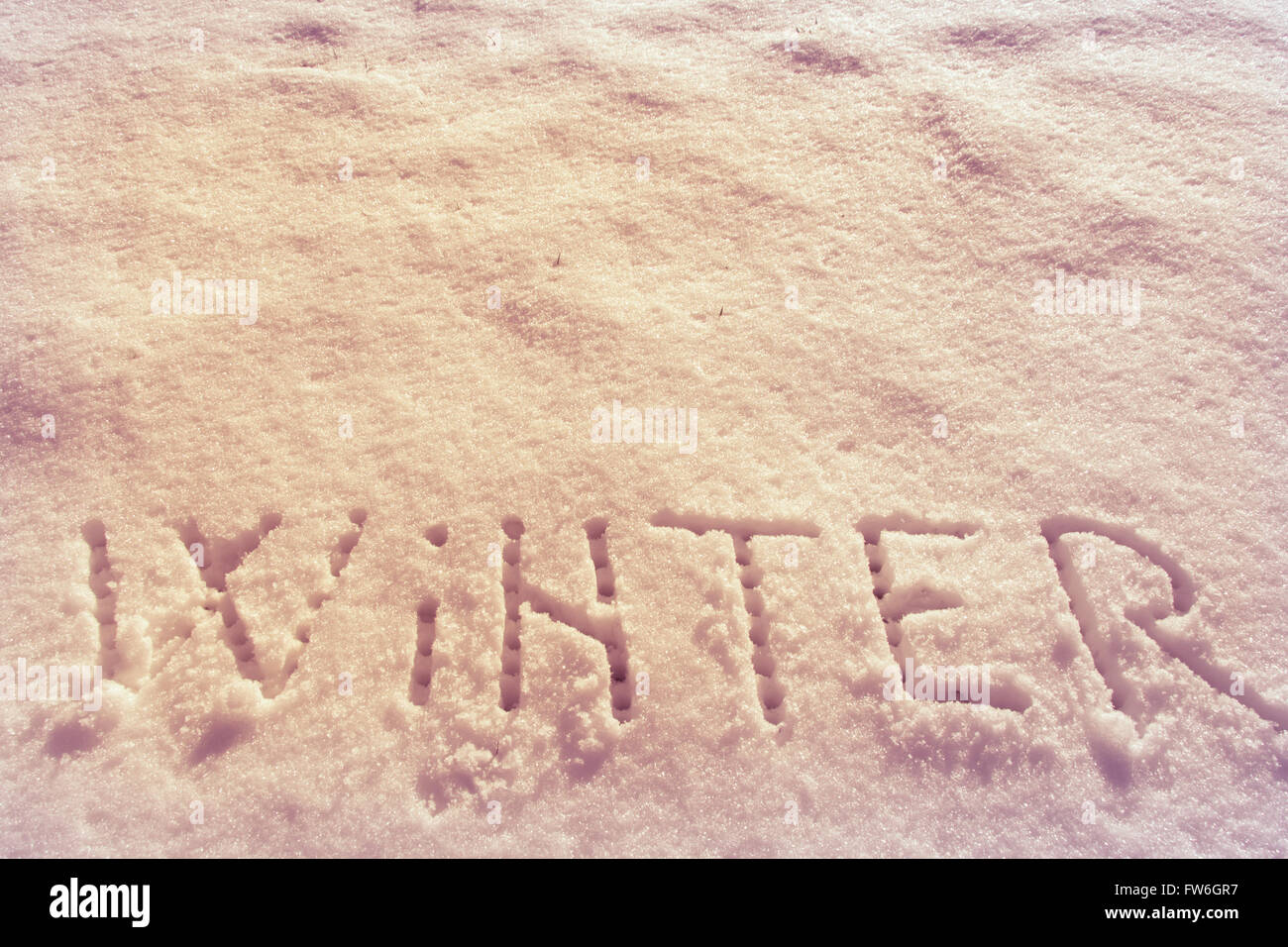 Parole scritte, inverno su un campo di neve Foto Stock