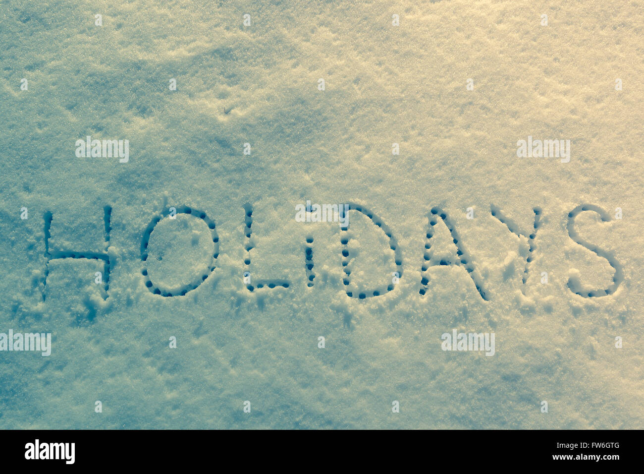 Parole scritte vacanze su un campo di neve Foto Stock