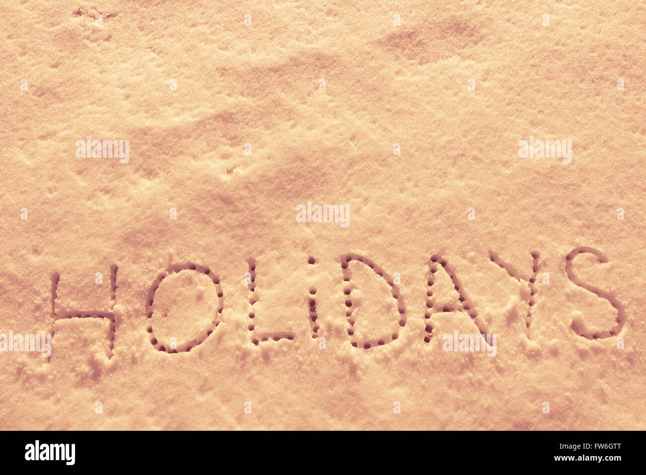 Parole scritte vacanze su un campo di neve Foto Stock