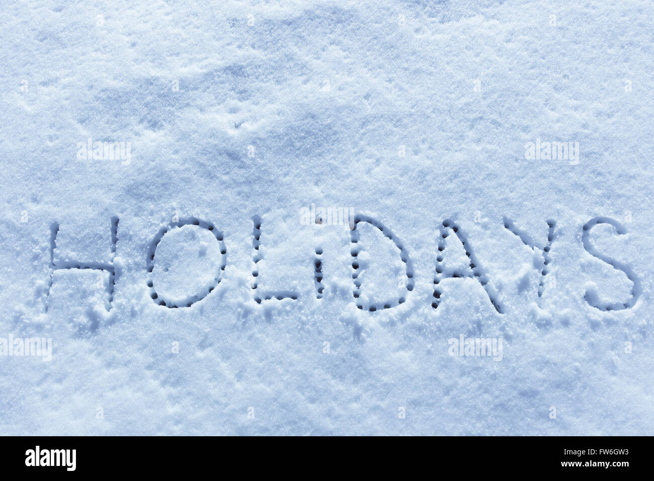 Parole scritte vacanze su un campo di neve Foto Stock
