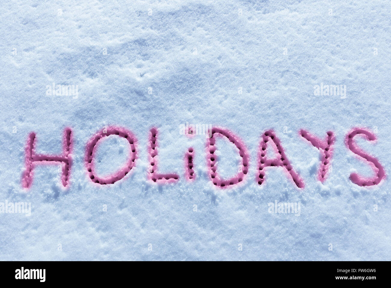 Parole scritte vacanze su un campo di neve Foto Stock