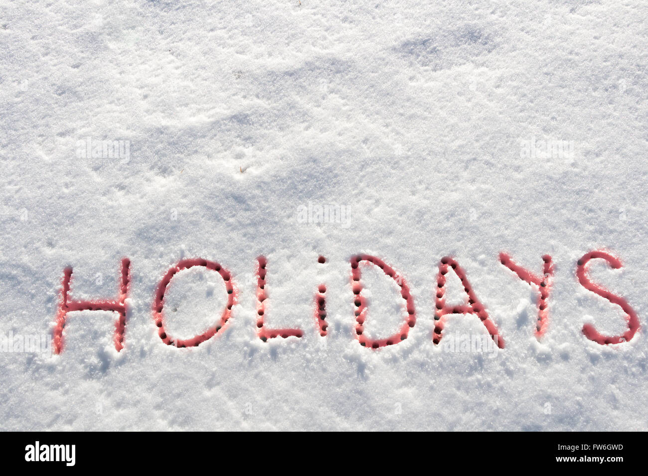 Parole scritte vacanze su un campo di neve Foto Stock