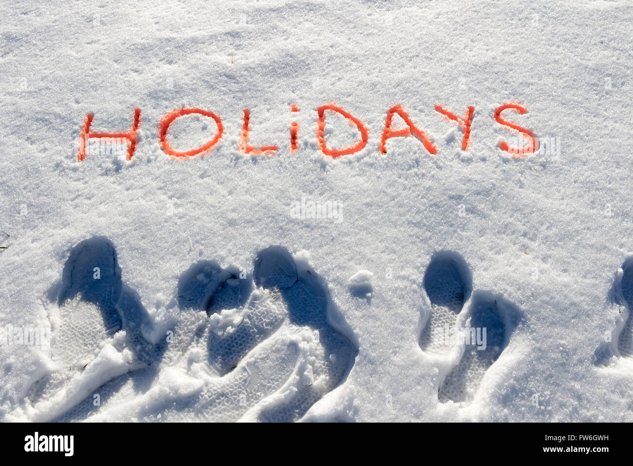 Parole scritte vacanze su un campo di neve Foto Stock