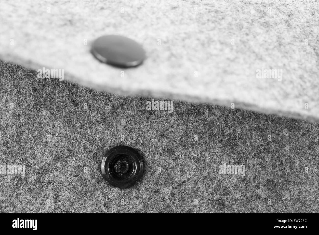 Close up sul prigioniero del nero di grigio sacco di tessuto la cui apertura Foto Stock
