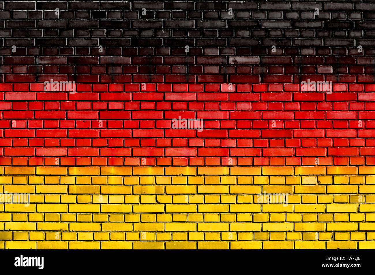 Bandiera della Germania dipinta su un muro di mattoni Foto Stock