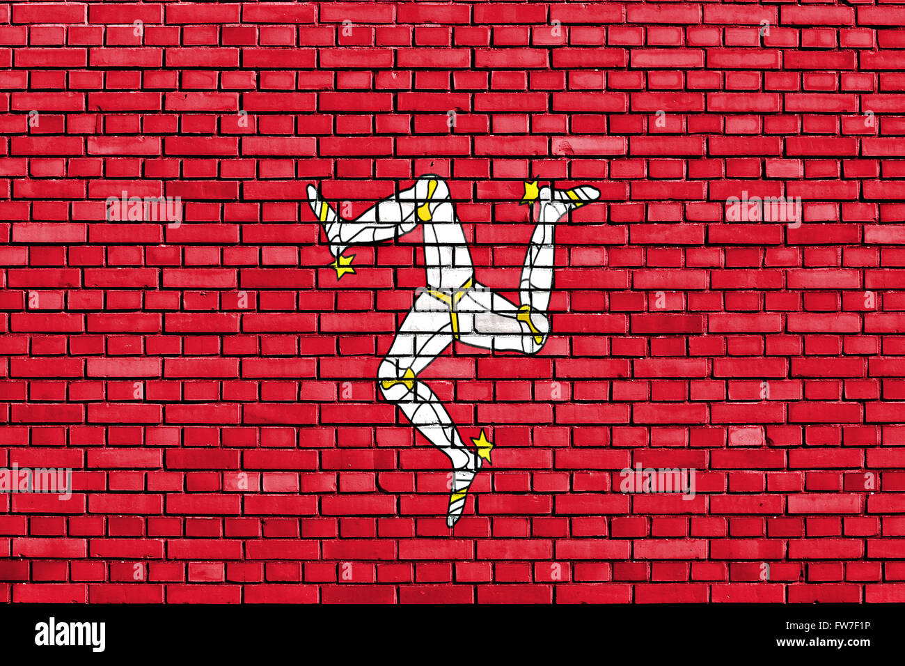 Bandiera dell'Isola di Man dipinta su un muro di mattoni Foto Stock