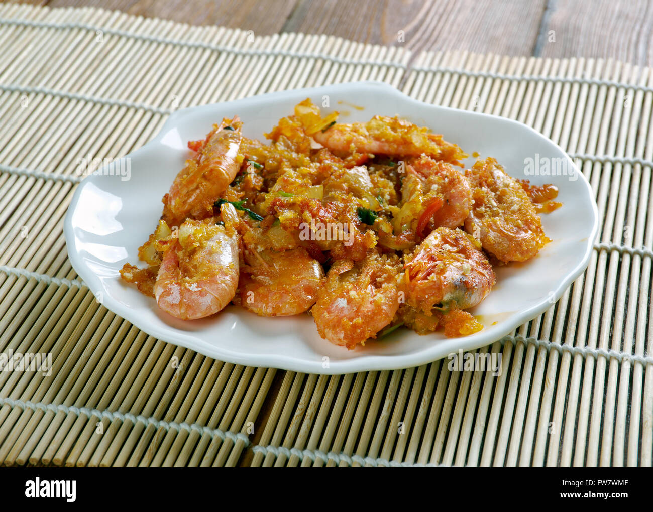 Gamberetti DeJonghe specialità di Chicago, è una casseruola di pomodori pelati interi gamberetti tappezzate in morbido, garlicky, sherry-allacciato cru di pane Foto Stock