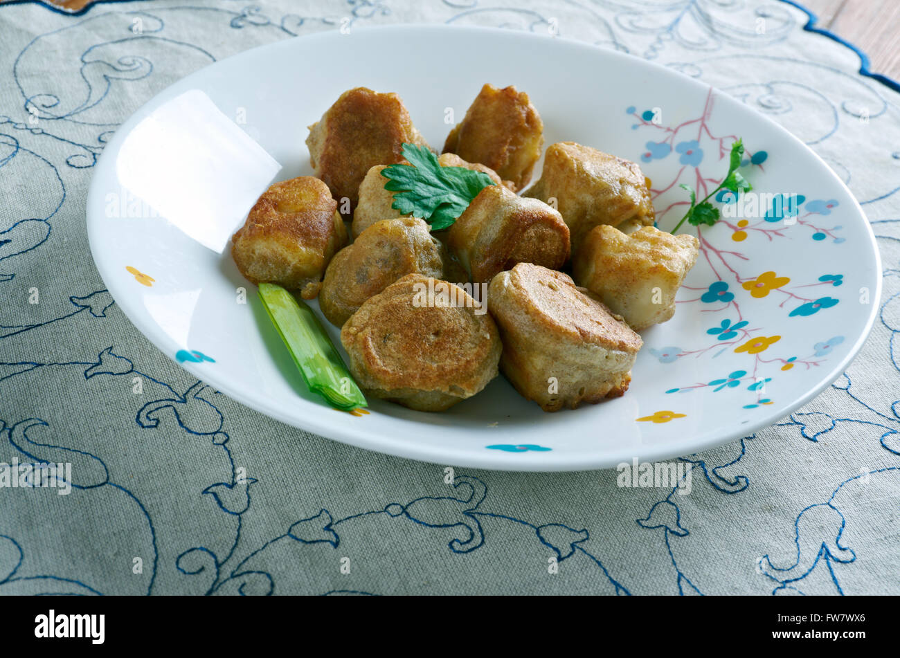 Timbro e andare - crocchette di pesce fatta con sale pesce in cucina Giamaicana Foto Stock