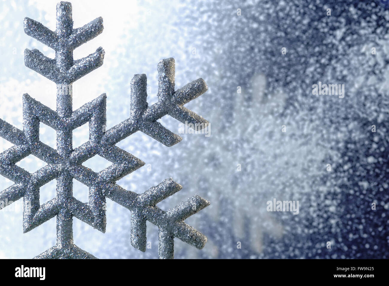 Il simbolo del fiocco di neve closeup con spazio di copia Foto Stock