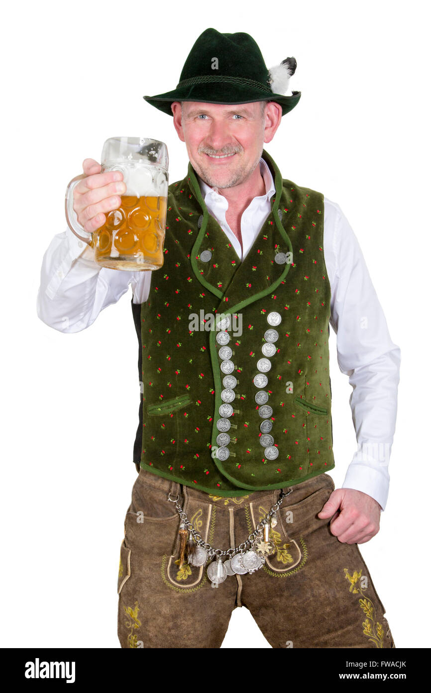 Uomo bavarese in tradizionali abiti bavarese tenendo un boccale di birra Foto Stock