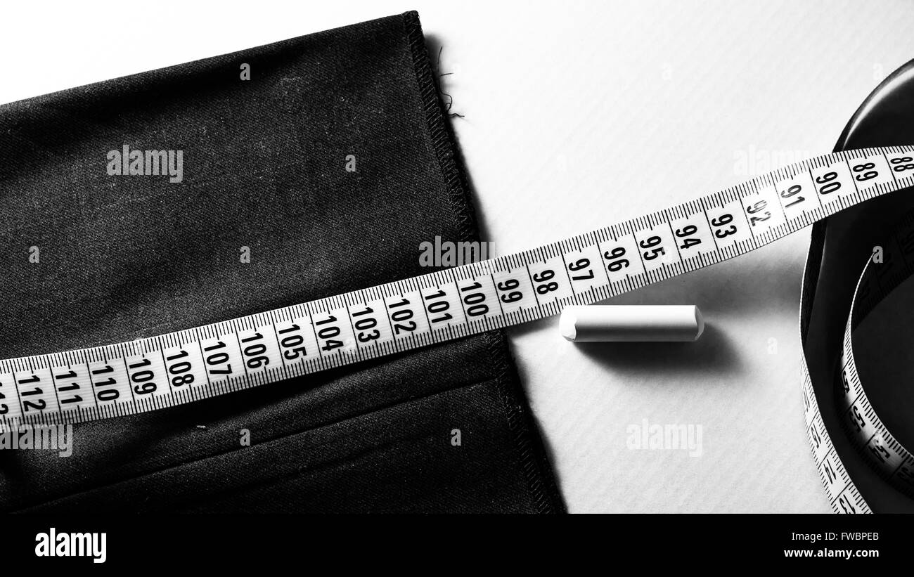Ancora in vita con un nastro di misurazione di un gesso e tessuto Foto Stock
