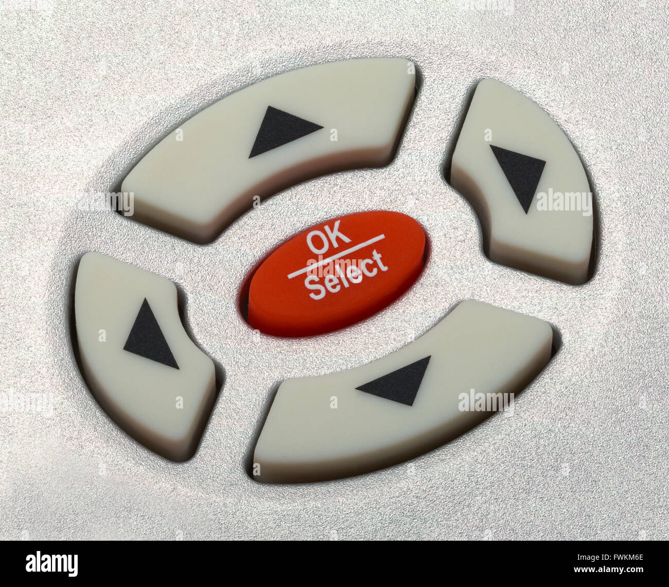 Close up della freccia per i pulsanti di selezione sul telecomando. Foto Stock