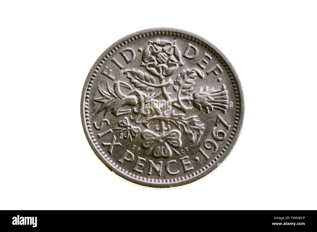 Vecchio sixpence pezzo, pre decimale monete del Regno Unito. Foto Stock