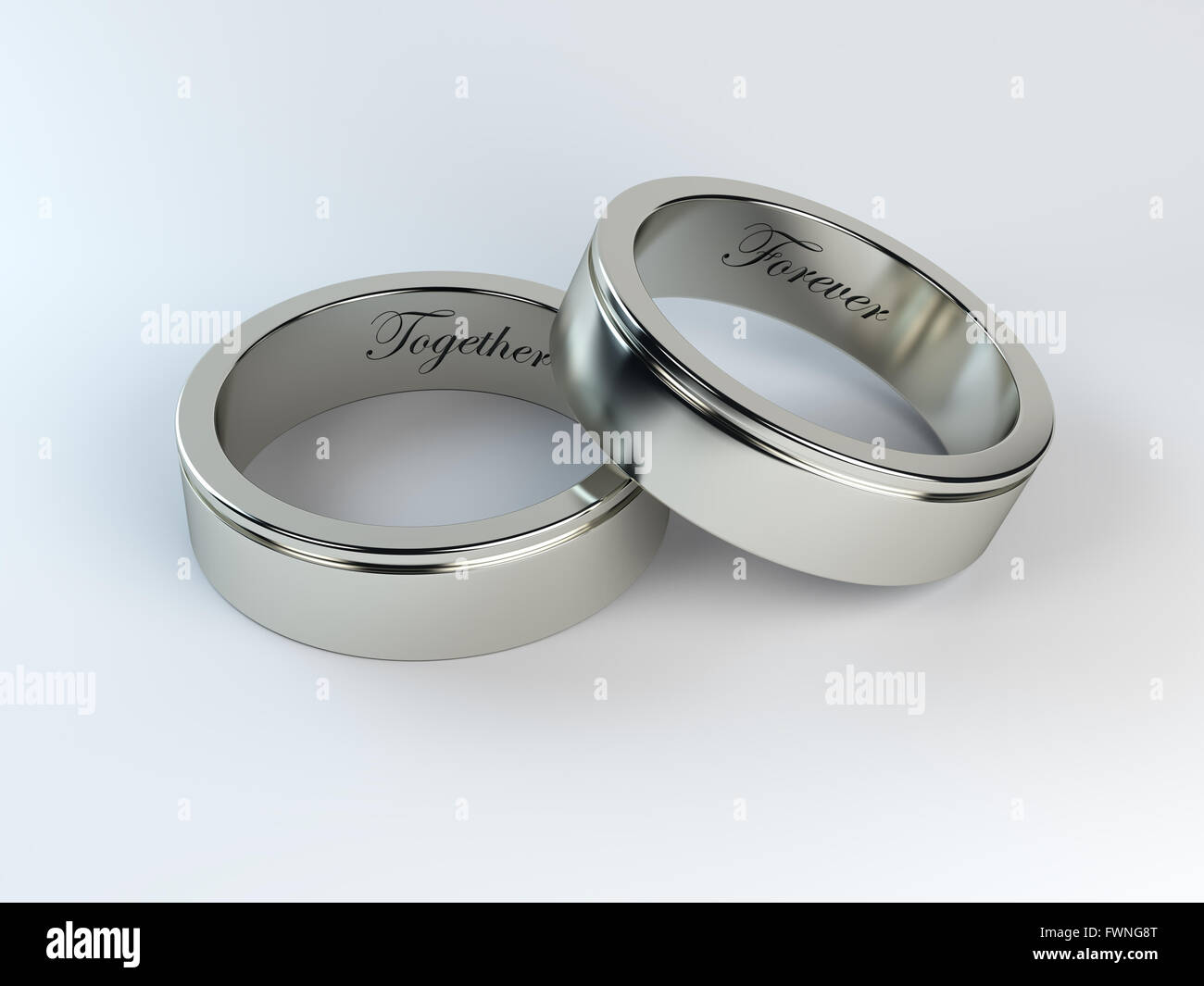 Gli anelli di nozze con incisione Foto Stock