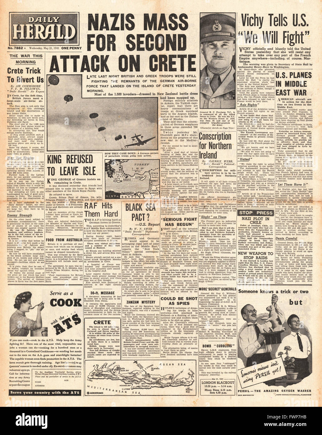 1941 front page Daily Herald le forze tedesche invadono Creta e la Francia di Vichy protesta per la minaccia degli Stati Uniti di territori francesi Foto Stock