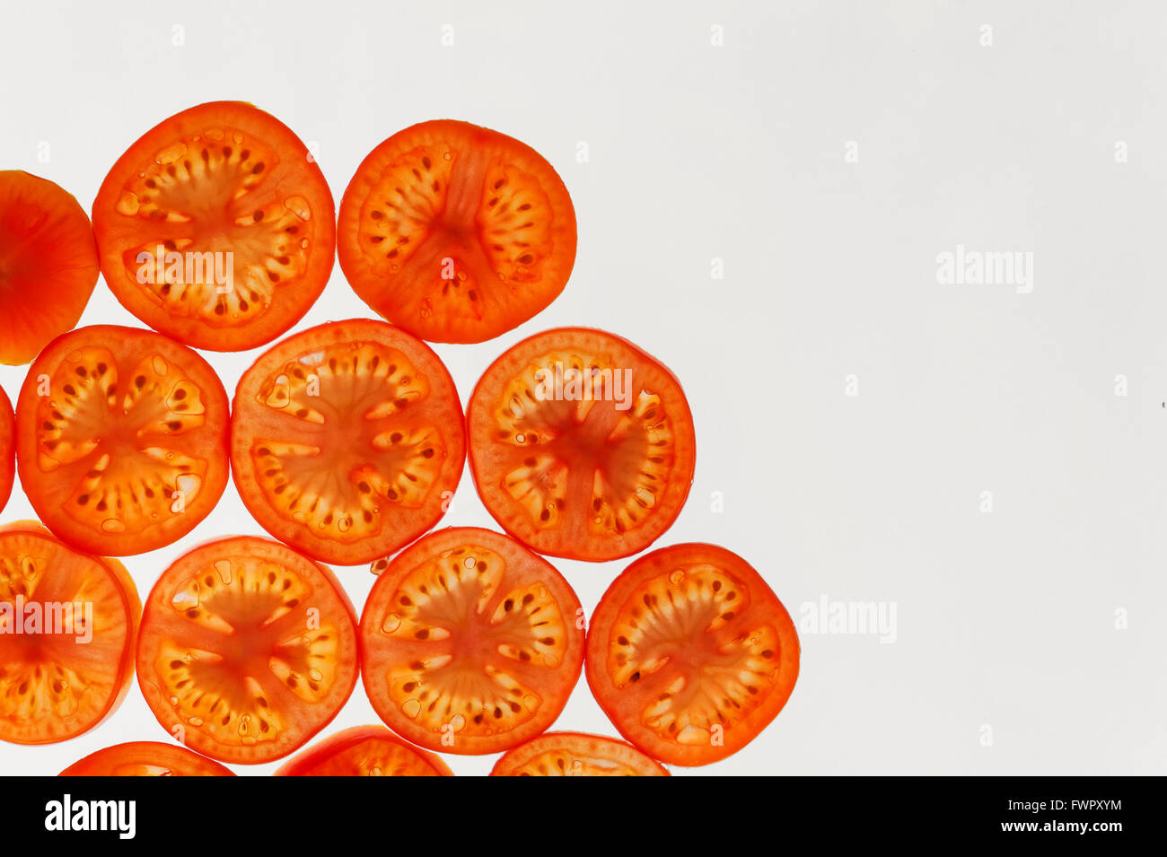 Ortaggi freschi fette pattern astratti sfondo, tomatoe rosso Foto Stock