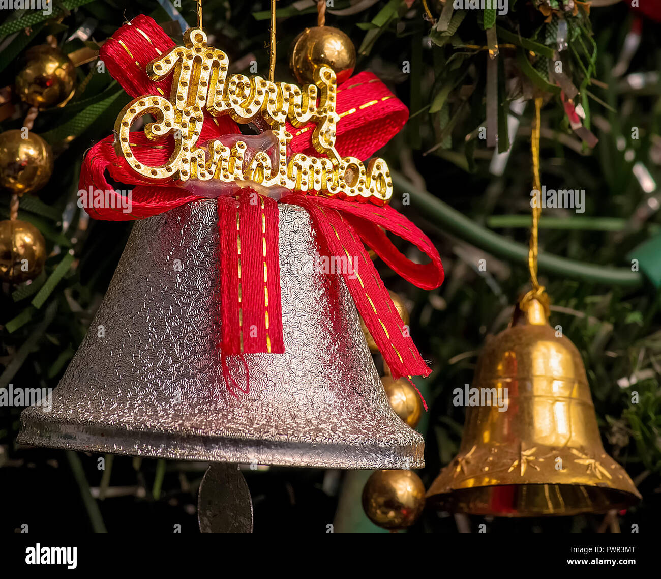 Anello in argento campana con buon natale decorazione Foto Stock