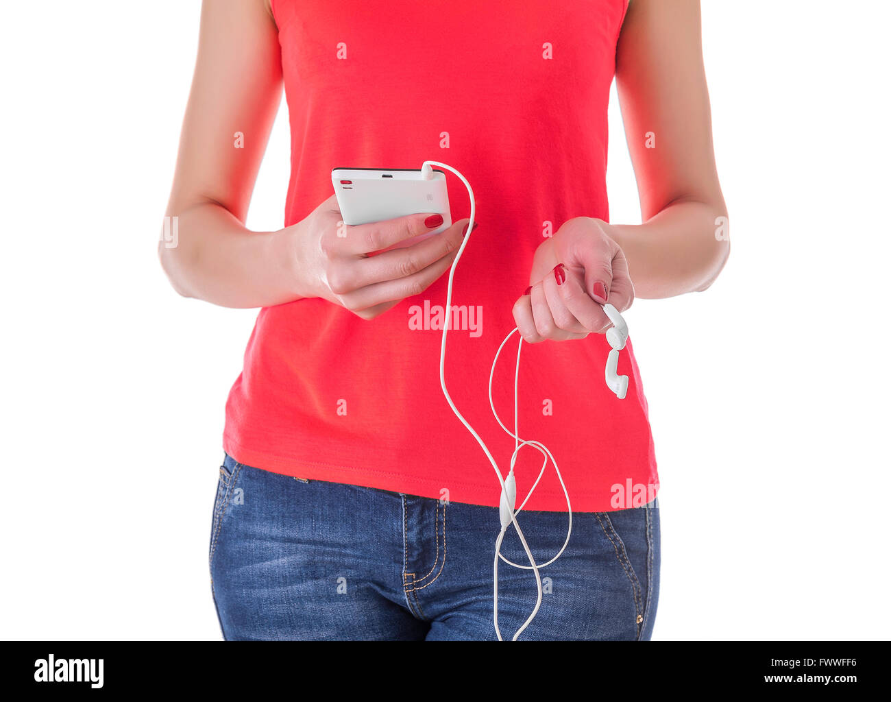 Ragazza ascoltando la musica del tuo telefono cellulare. Silhouette su uno sfondo bianco. Foto Stock