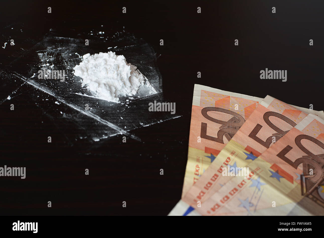La cocaina e denaro Foto Stock