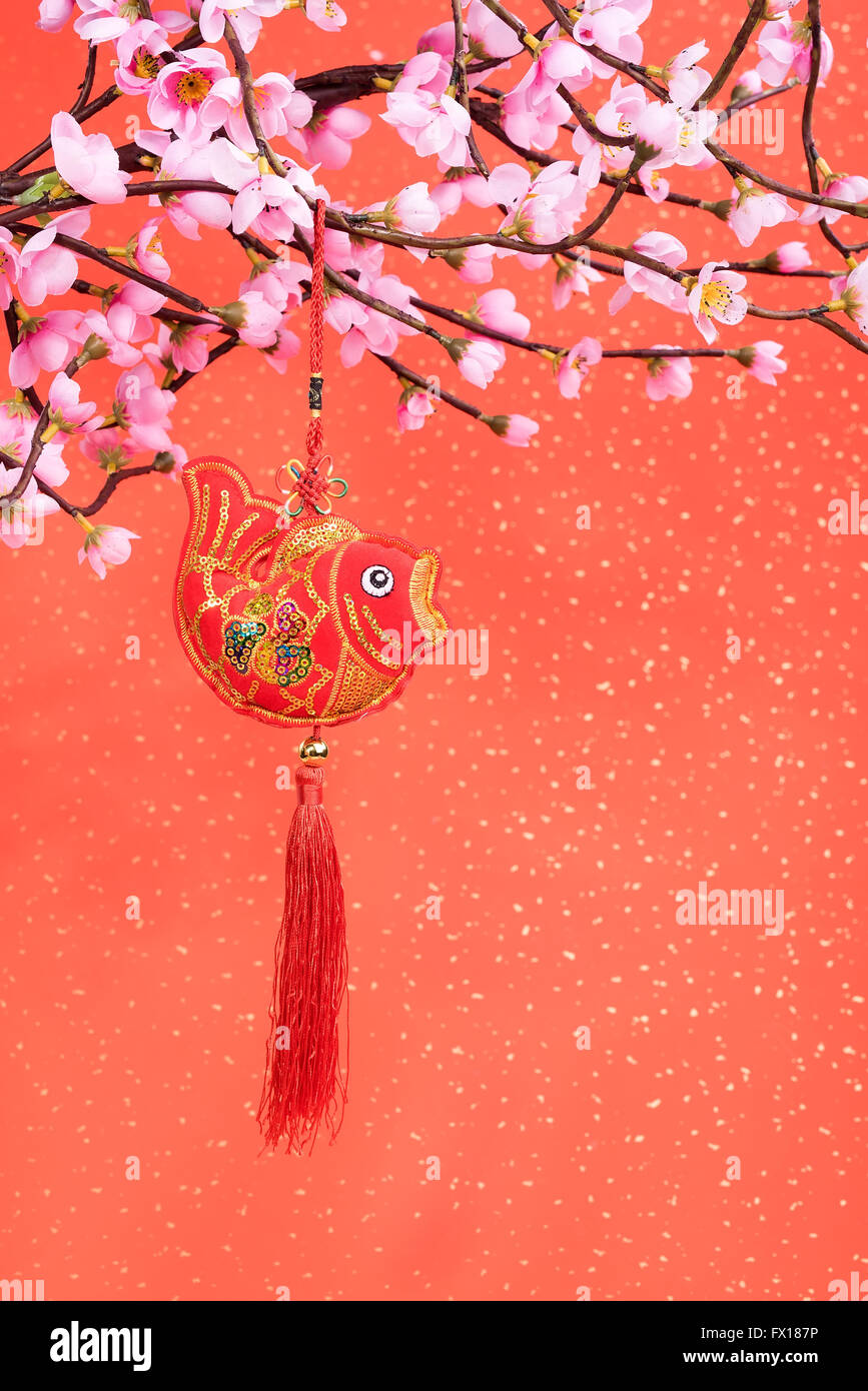 Cinese tradizionale e nodo di lingotto d'oro significa simboli di ricchezza e prosperità Foto Stock