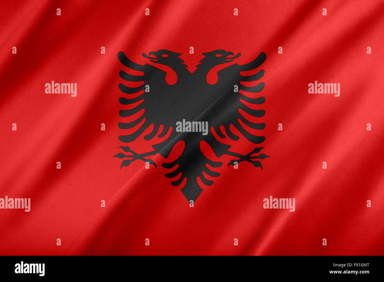 Bandiera dell'Albania. che fluttua nel vento. Foto Stock