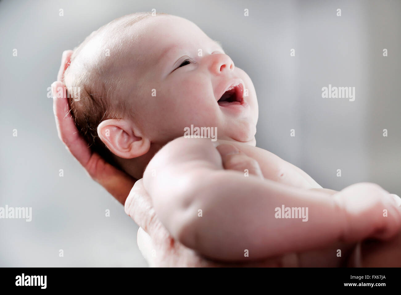 Close up Laughing baby boy Foto Stock