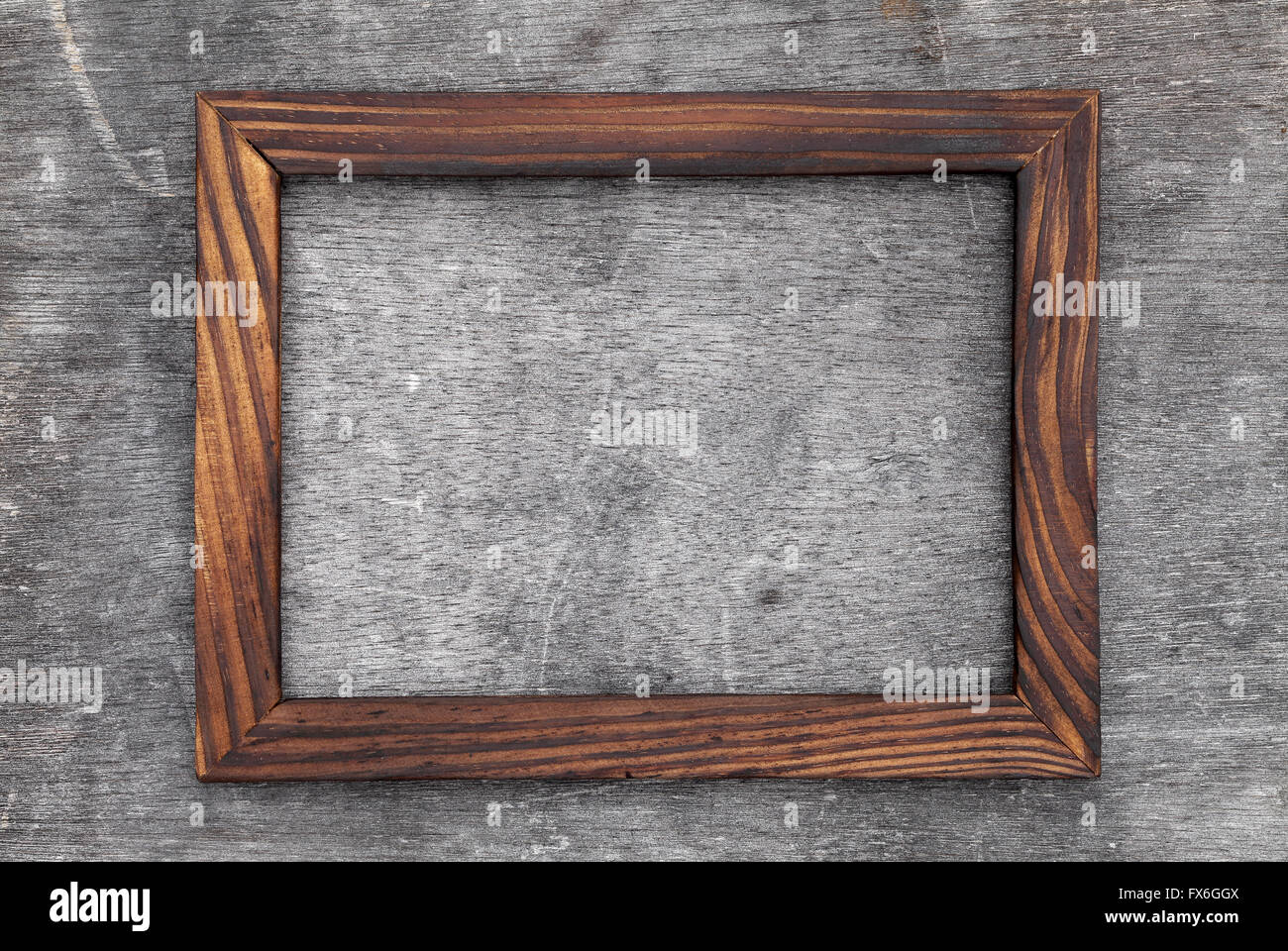 Legno grano cornice immagine su sfondo grunge Foto Stock