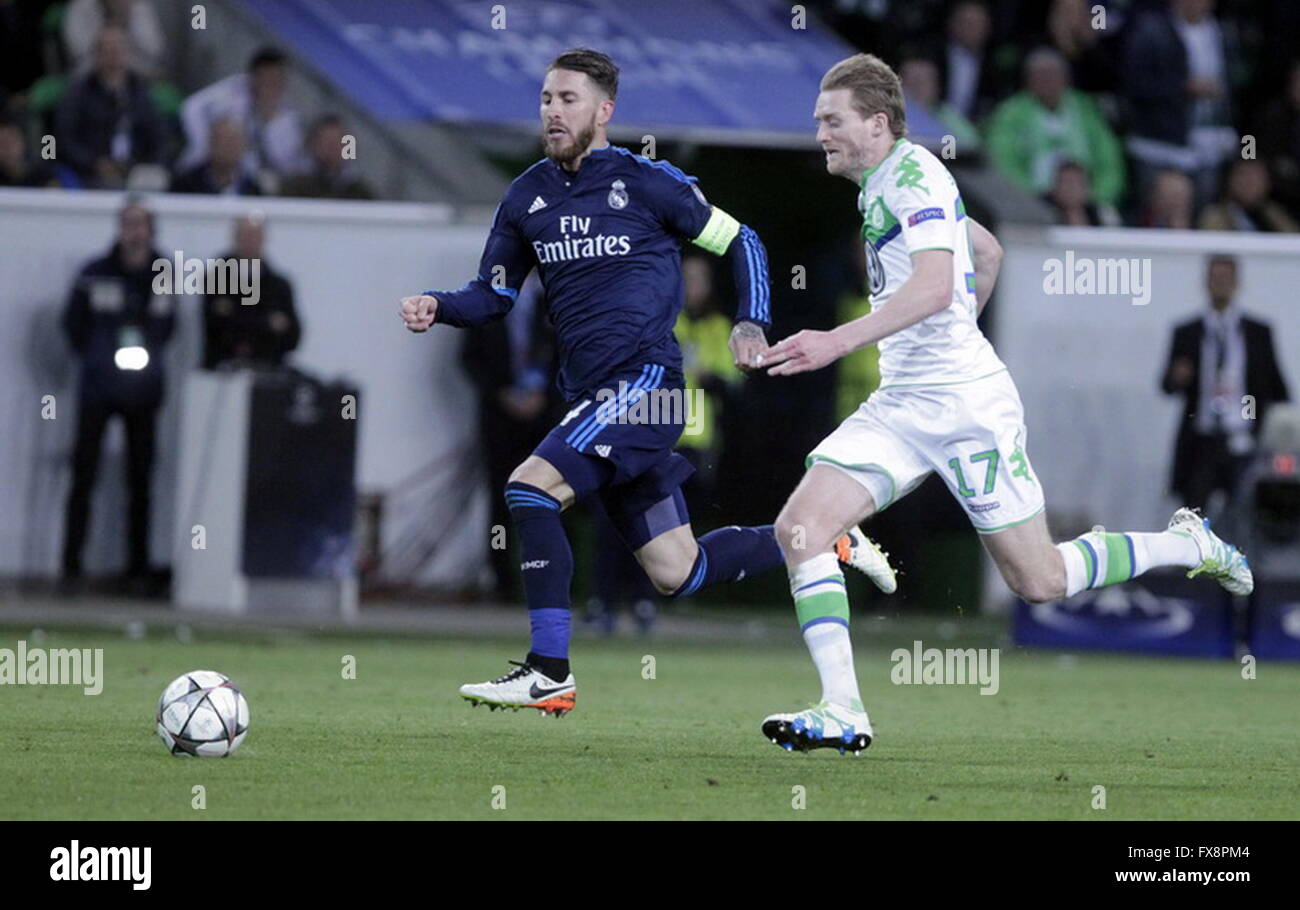André Schürrle e Sergio Ramos in azione durante la vincitrice del campionato Wolfsburg match - Real Madrid Foto Stock