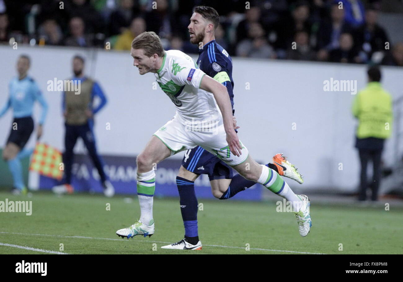 André Schürrle e Sergio Ramos in azione durante la vincitrice del campionato Wolfsburg match - Real Madrid Foto Stock
