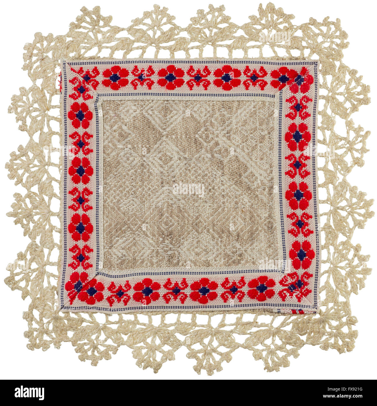 Biancheria Hand-Knitted Tovagliolo da tavola con ornamento isolato Foto Stock
