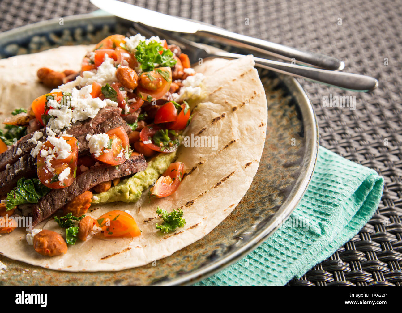 Carni bovine burrito con peperoncino verde Foto Stock