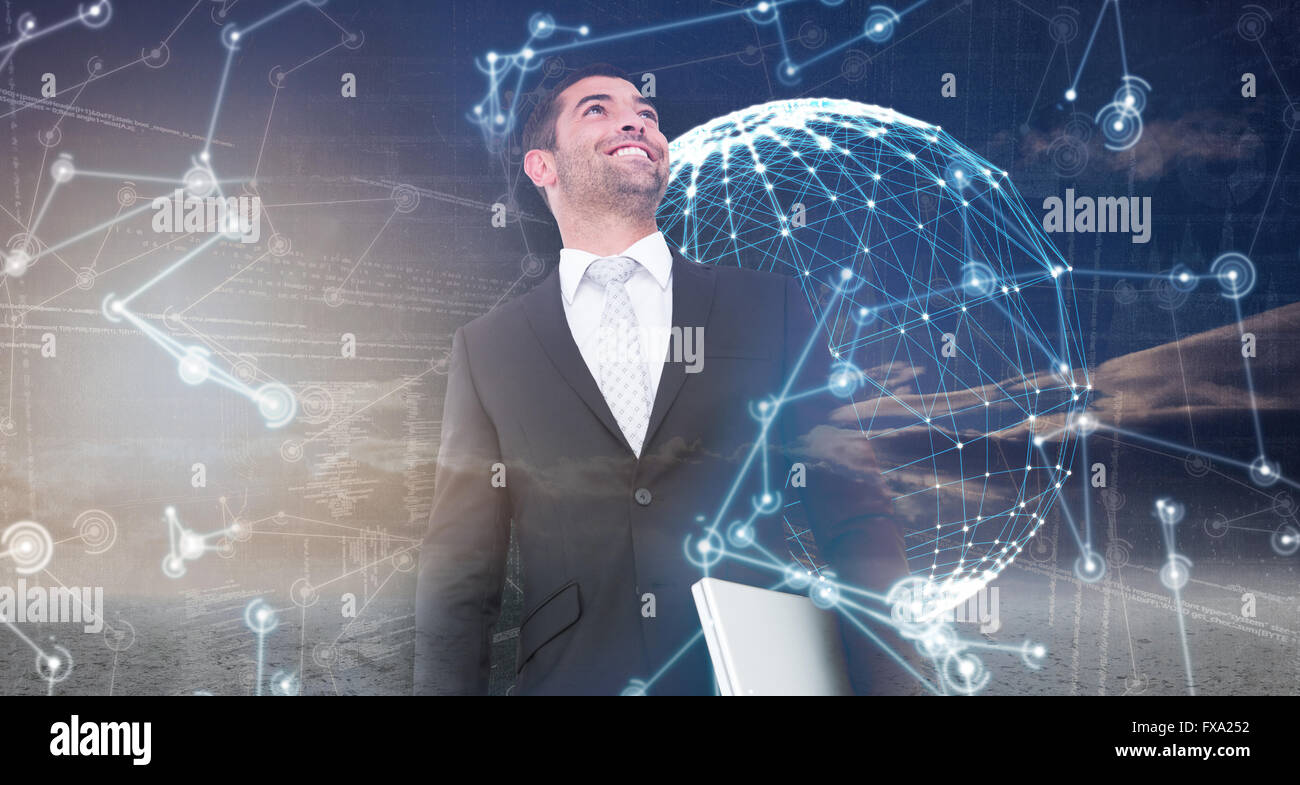 Immagine composita di imprenditore ricerca azienda laptop Foto Stock