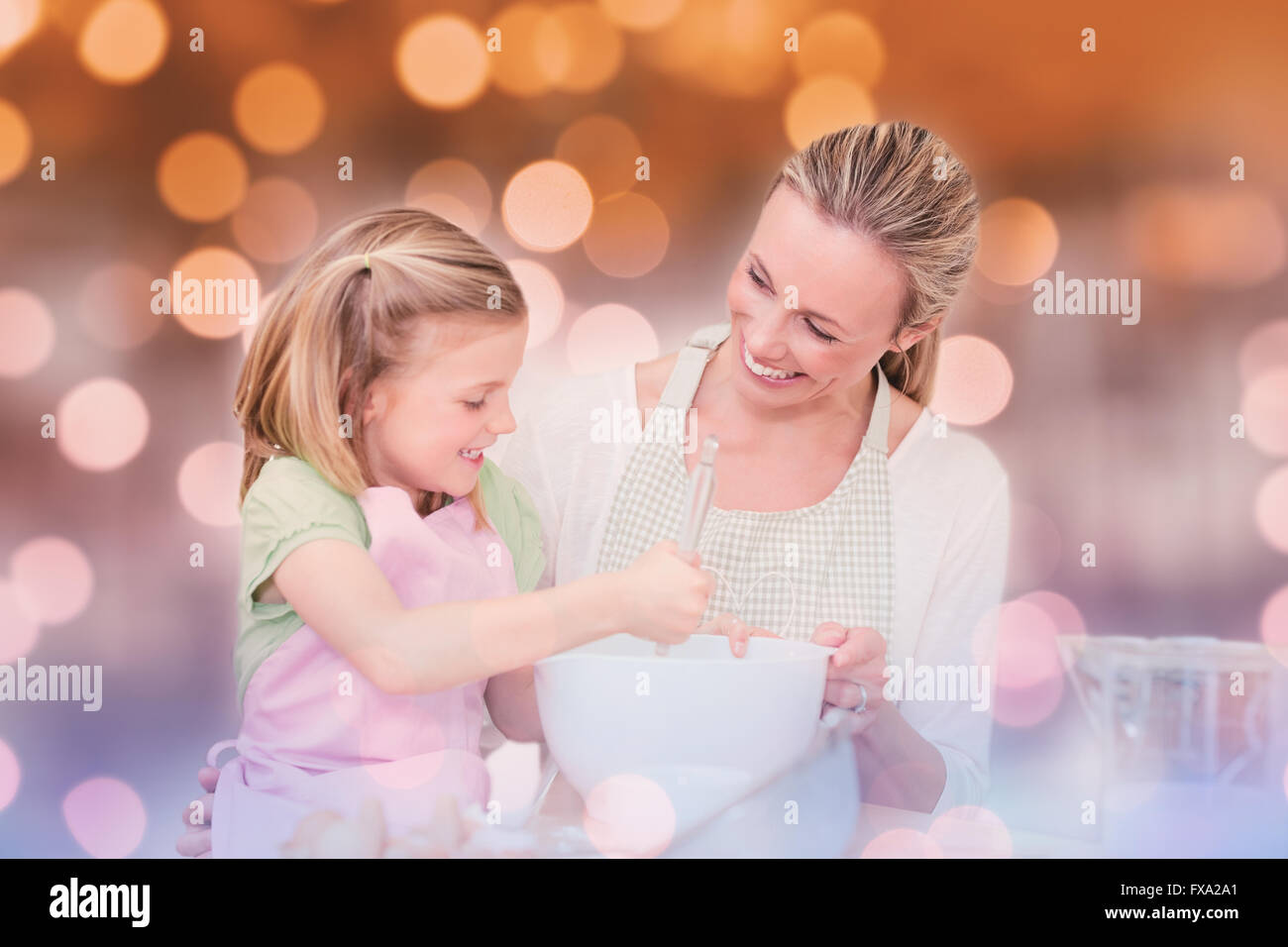 Immagine composita della madre e figlia divertirsi in cucina Foto Stock