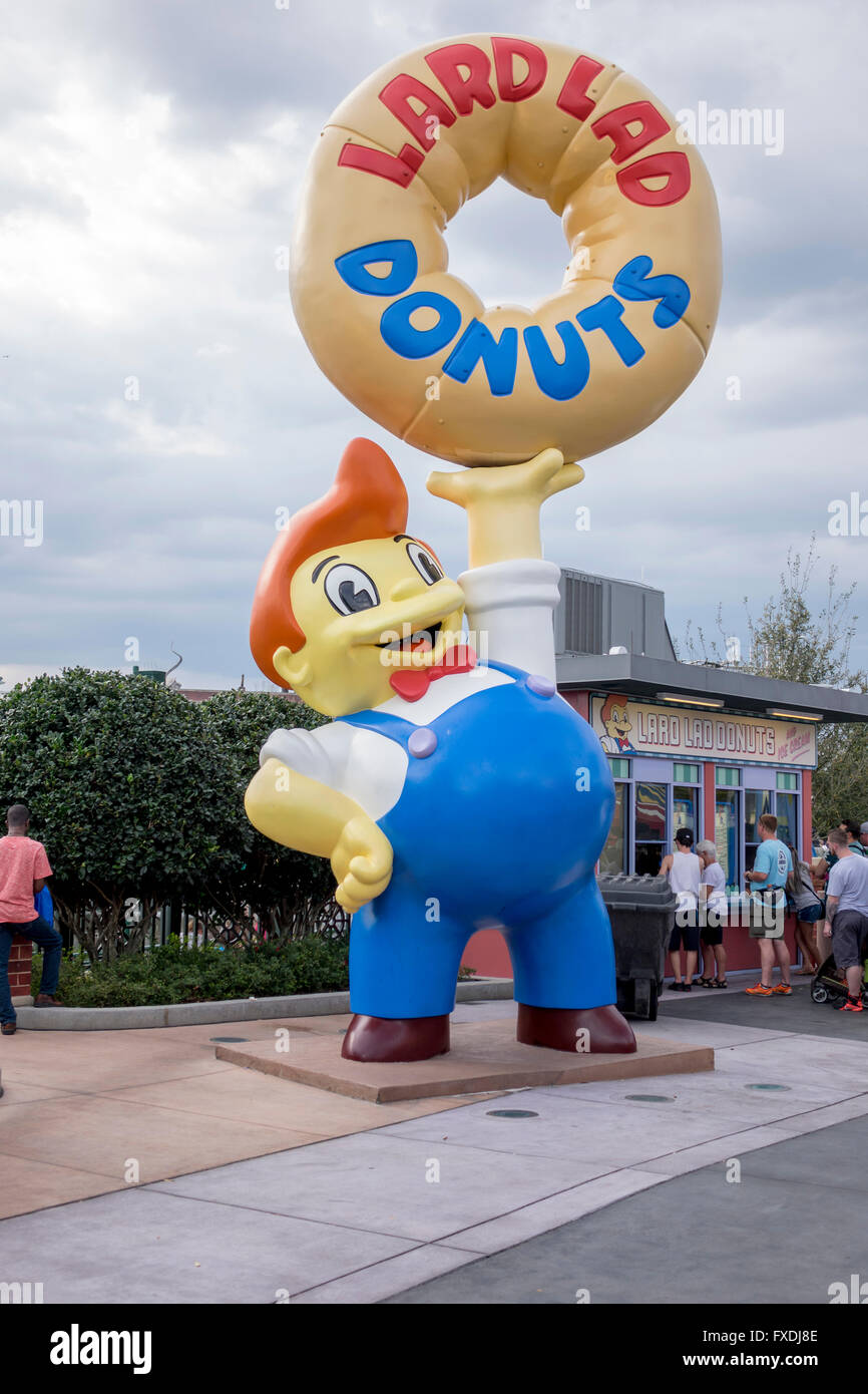 Lo strutto Lad ciambelle pubblicità statua Figura da The Simpsons Cartoon TV Show all'Universal Studios il Parco a Tema di Orlando in Florida Foto Stock