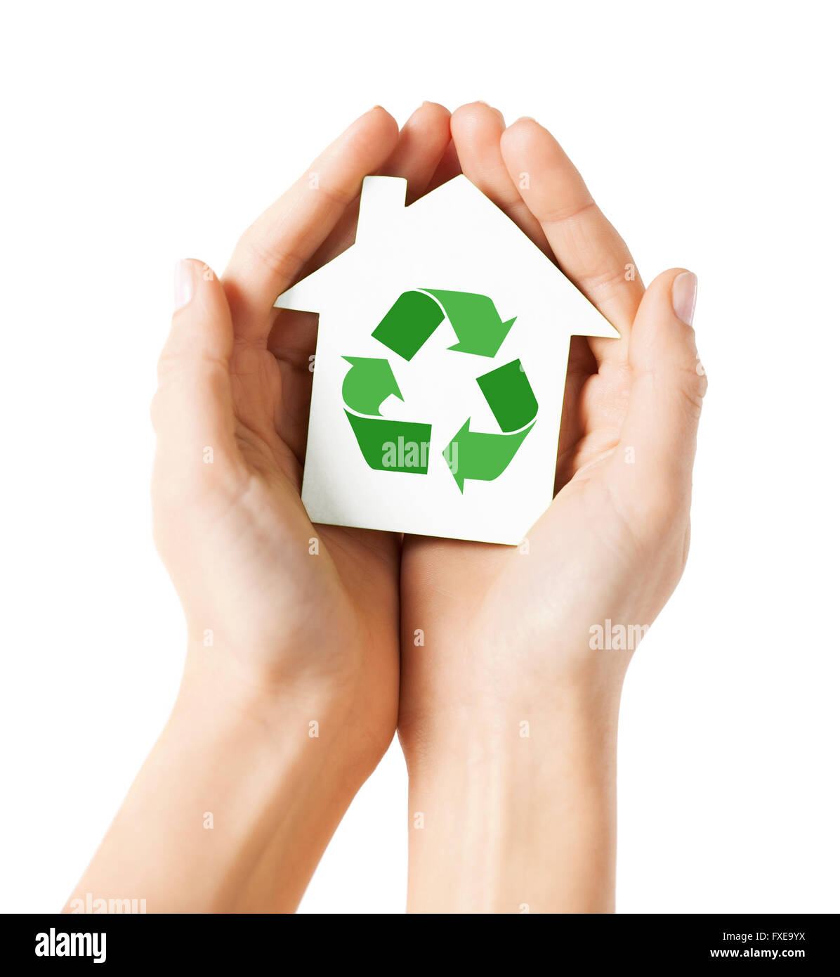 Mani casa verde con il segno di riciclaggio Foto Stock