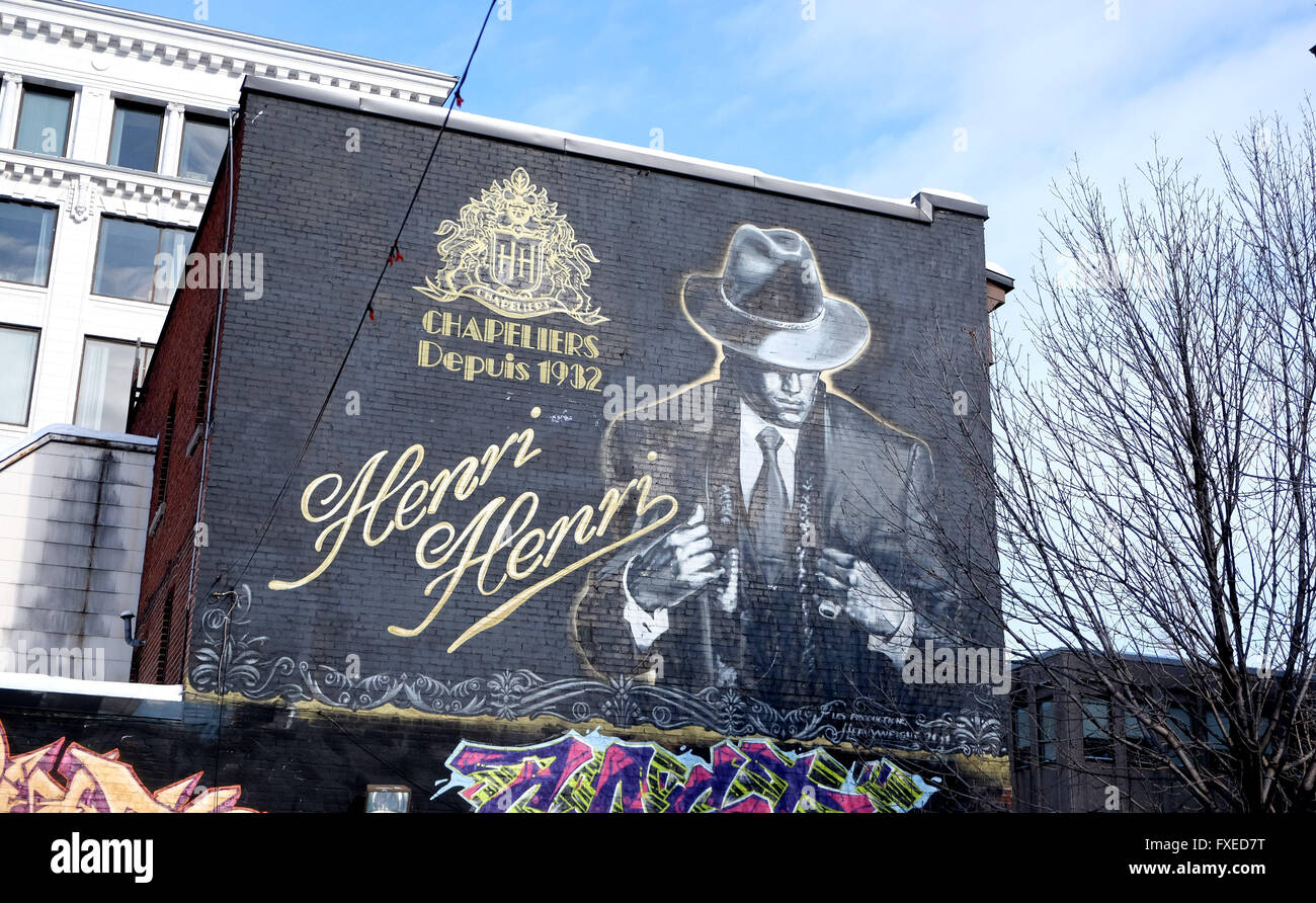 Un stile vintage annuncio sul lato di un edificio a Montreal in Canada. Foto Stock