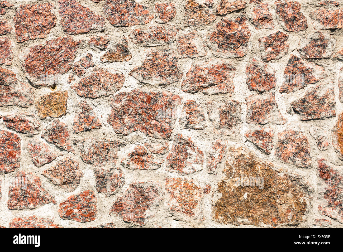 Dettaglio texture della vecchia grigio-marrone a muro di pietra Foto Stock