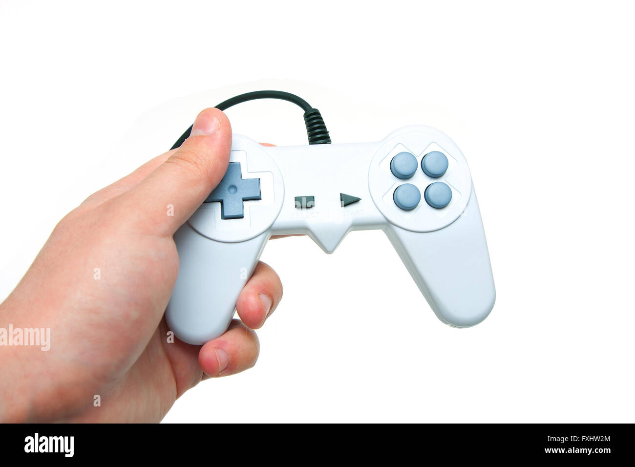 Bianco controller di gioco in mano Foto Stock