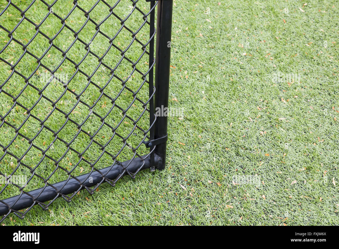 A catena collegamento recinto gate a ball park Foto Stock