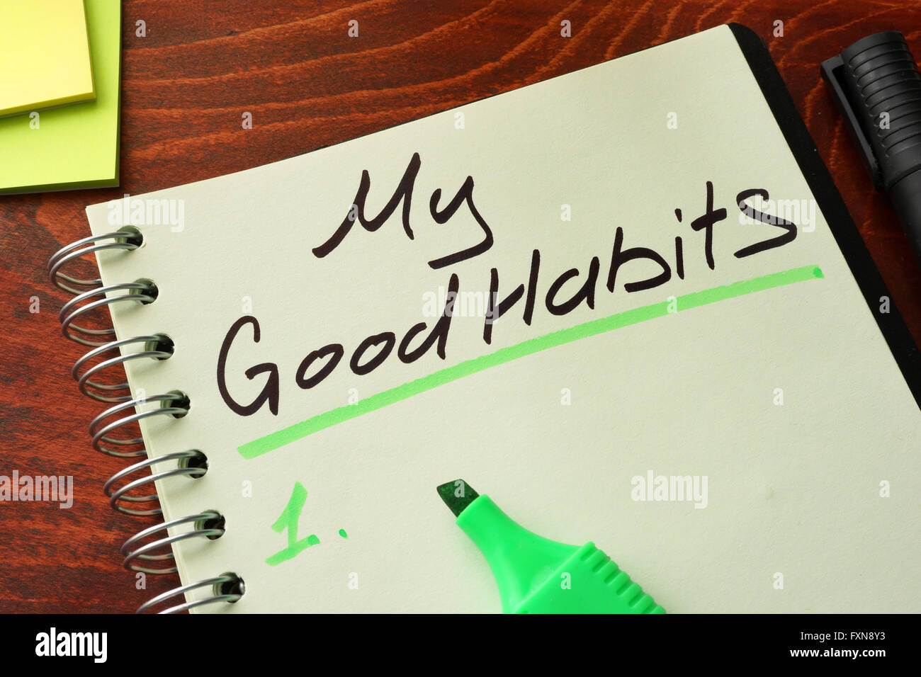 Le mie buone abitudini scritto su un blocco note. Concetto di motivazione. Foto Stock