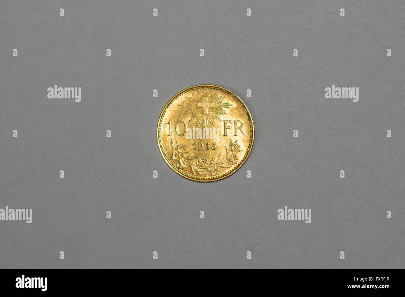 10 Franchi moneta in oro, doppiato Goldvreneli. Coniate nel 1913. Foto Stock