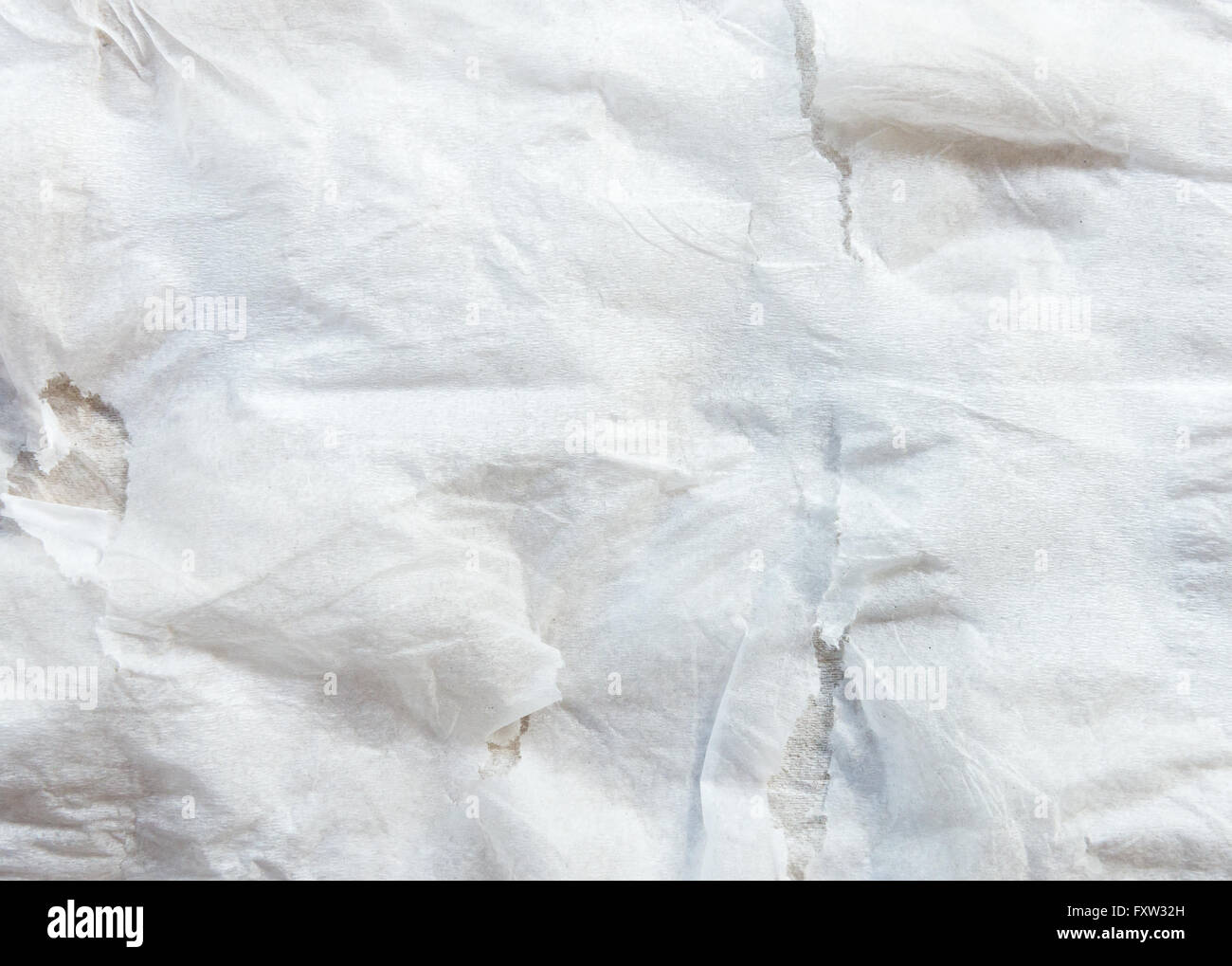 Bianco tessuto morbido con lacrima da asciugare il viso. Foto Stock