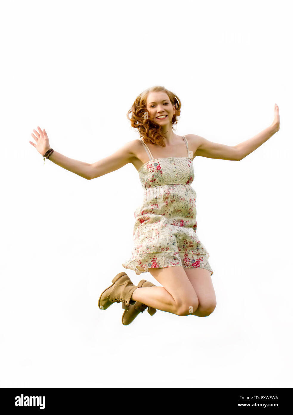 Happy girl jumping Foto Stock